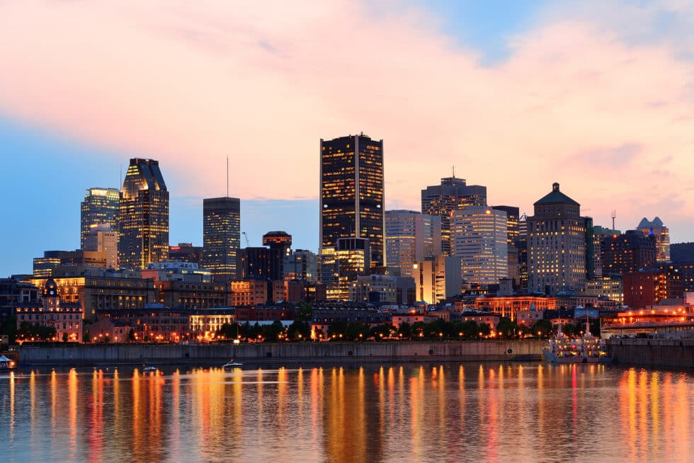 Resort Concierge Escapes Reviews highlights Montreal's skyline and waterfront as part of a city known for culture, art, and European character.
